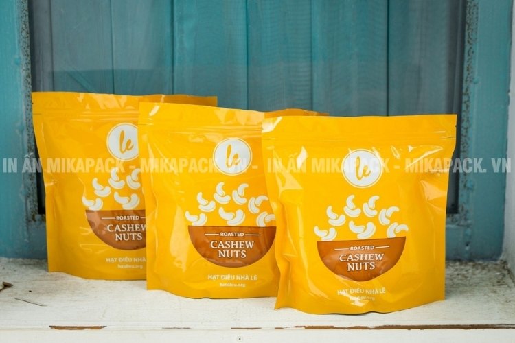 Mẫu bao bì hạt điều in ấn tối giản, màu sắc tươi sáng.