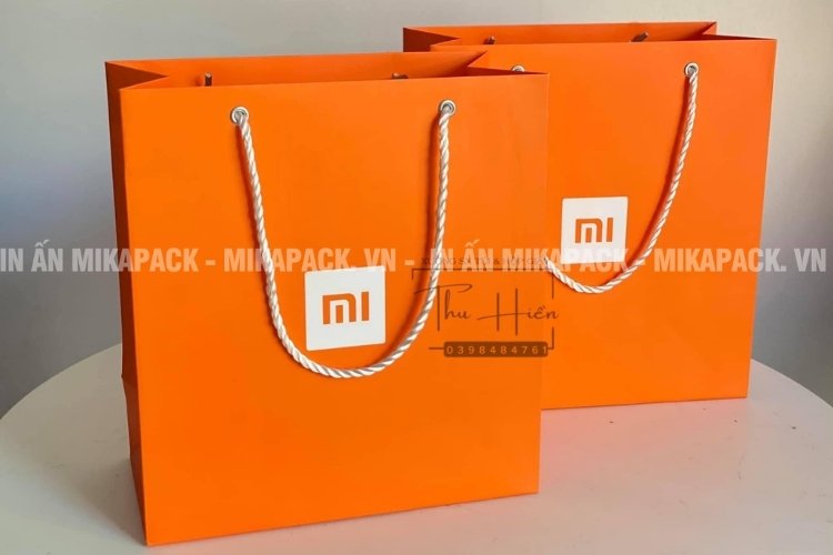 Mẫu thiết kế túi giấy đựng điện thoại cho cửa hàng uỷ quyền.